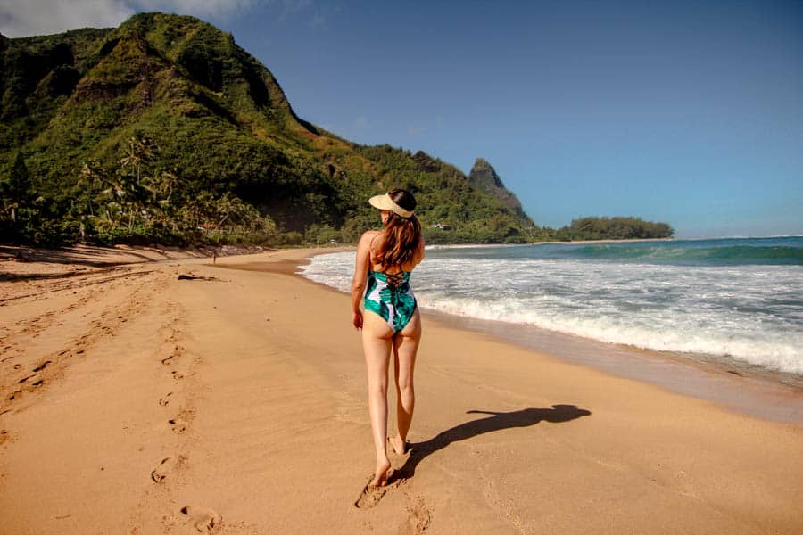 girl standing on tunnels beach in Kauai Hawaii
