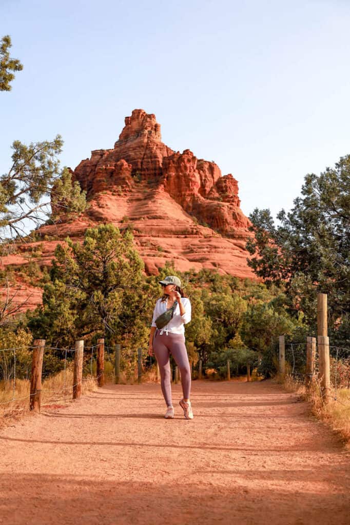 girl standind in front of Bell Rock hiking trail