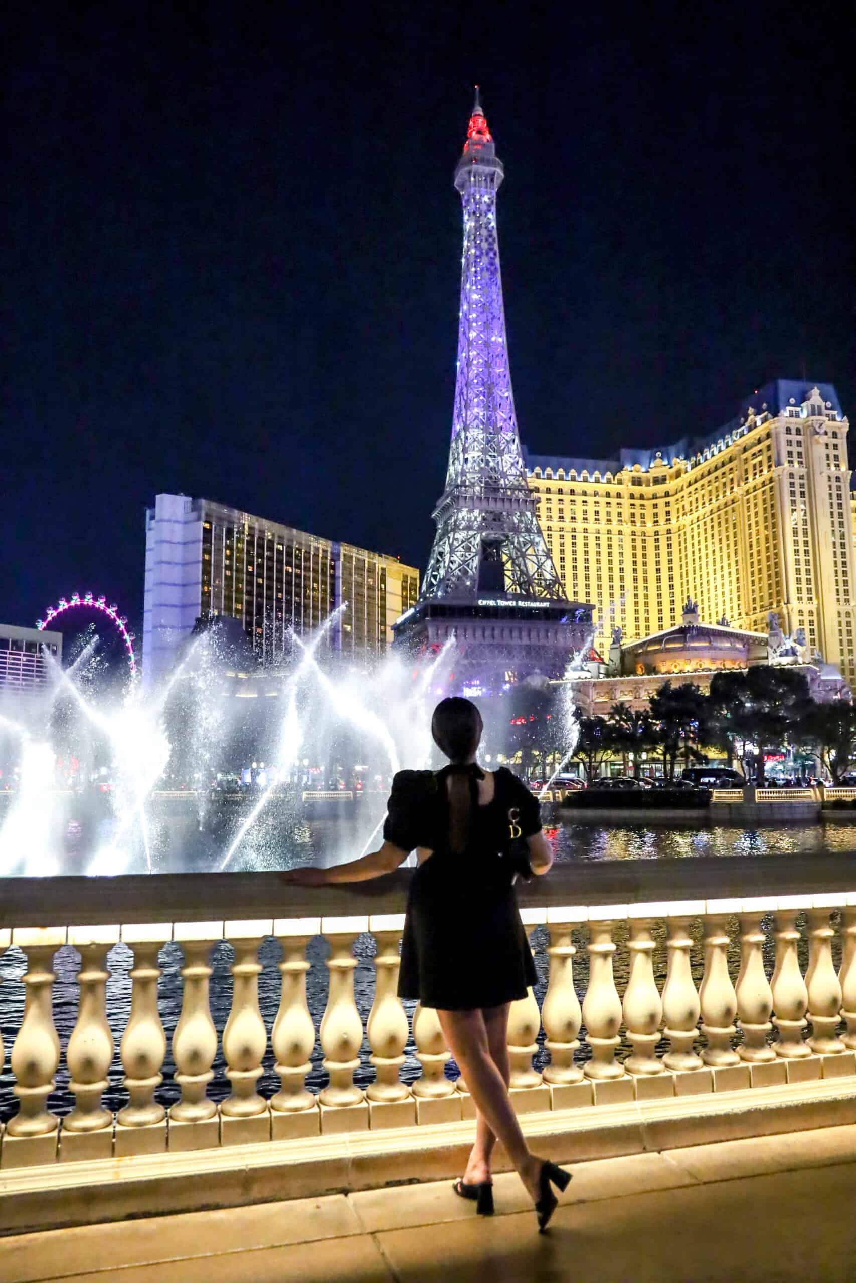 woman standing in front of Bellagio Fountains in Las Vegas