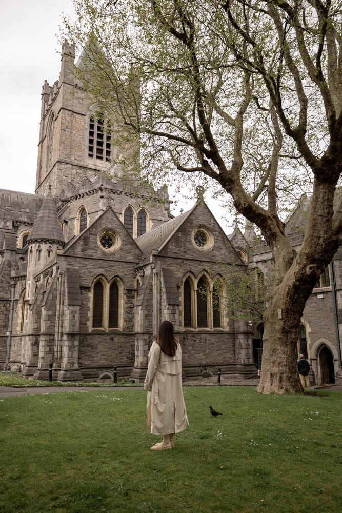 woman standing in front of Christ Church Cathedral