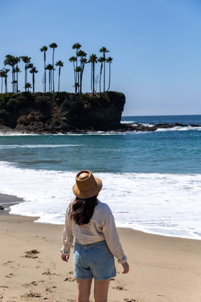 woman standing in front of ocean at crescent bay park