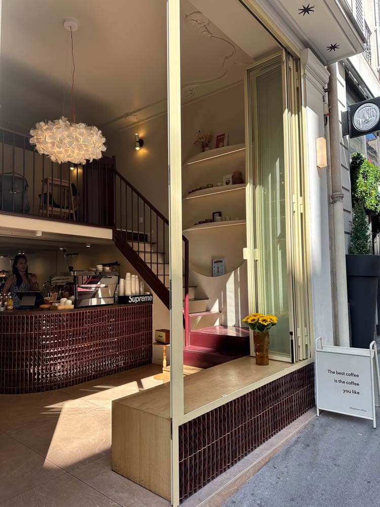 exterior of darling coffee in Paris with burgundy tiles and modern interior