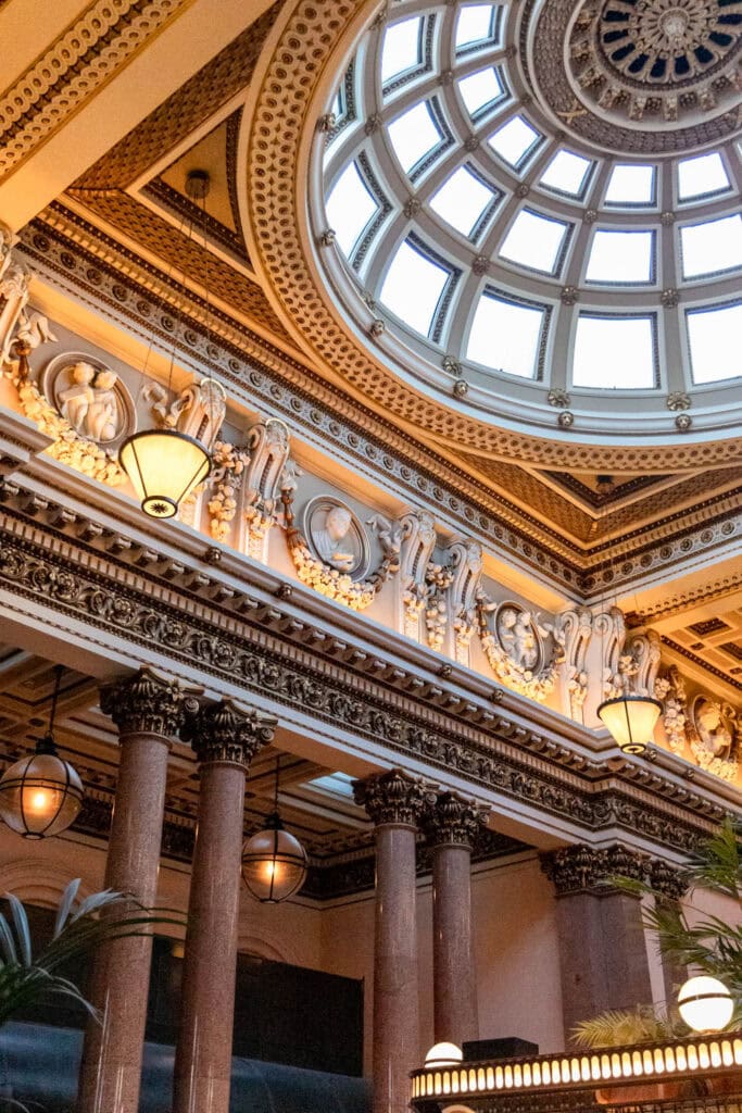 ornate marble column and details inside of a restaurant