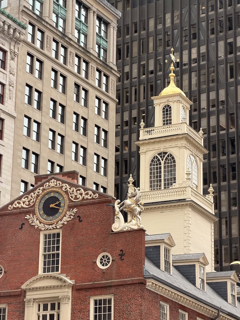 View of Independence Hall with surrounding skyscrapers in Boston.