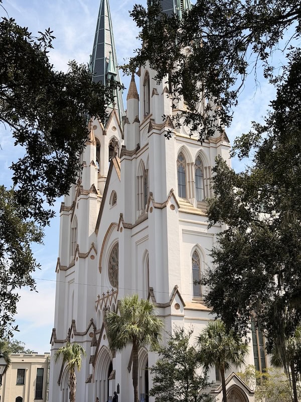 Gothic-style church with tall spires and ornate architecture.